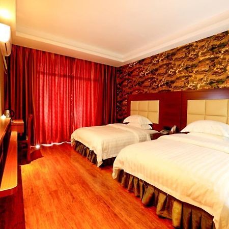 Zhangjiajie City Of Green Theme Hotel Wulingyuan Bagian luar foto